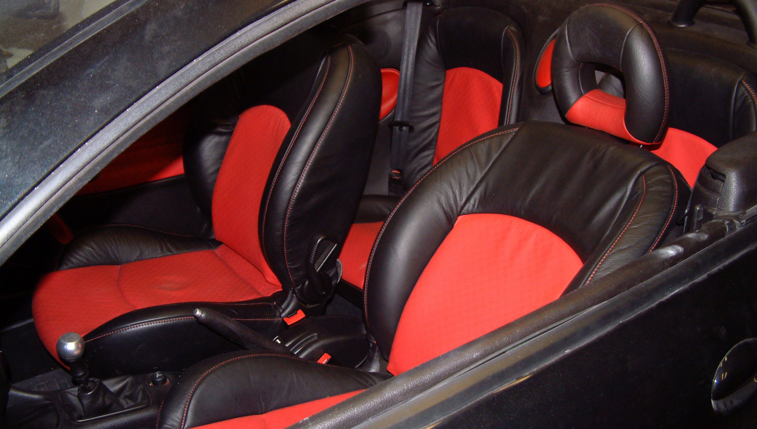 Black+leather+and+red+car+upholstery